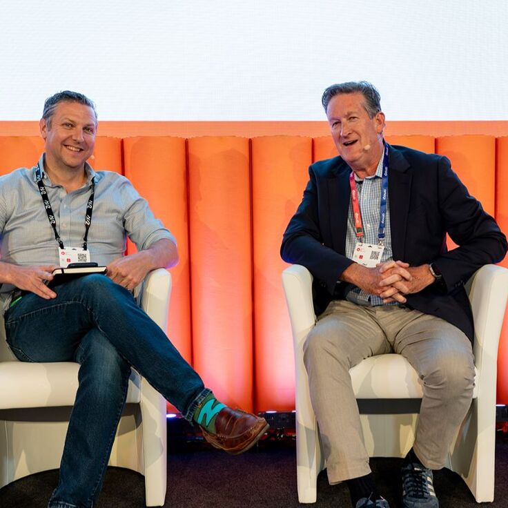 L-R: Jonathan Low, VP, Channel Sales, Partnerships, Zixi, in conversation with Paul Finster, VP, Business Development, Partnerships, Amagi. 	 